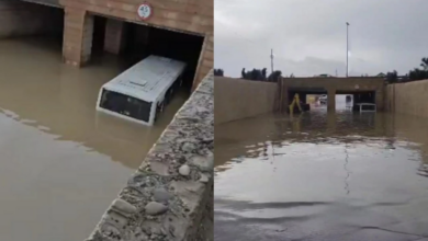 Bakıda sərnişin avtobusu suyun içində qaldı - Sərnişinlər kəndirlə xilas edildi