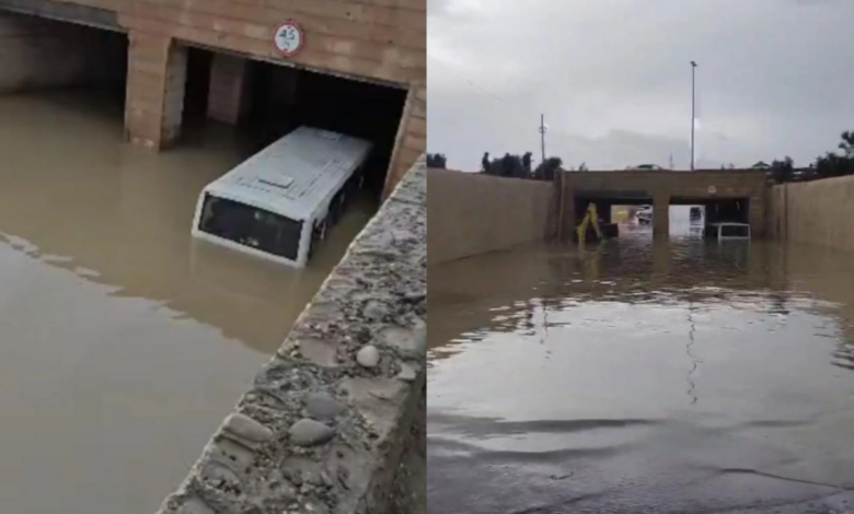 Bakıda sərnişin avtobusu suyun içində qaldı - Sərnişinlər kəndirlə xilas edildi